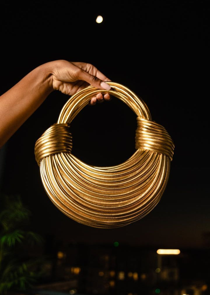 GOLD NOODLE CLUTCH BAG